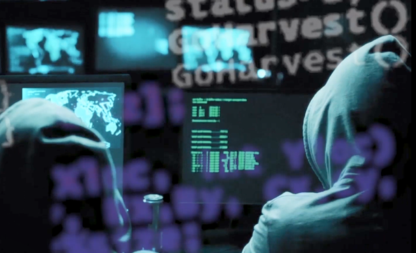 hackers in front of screens bg