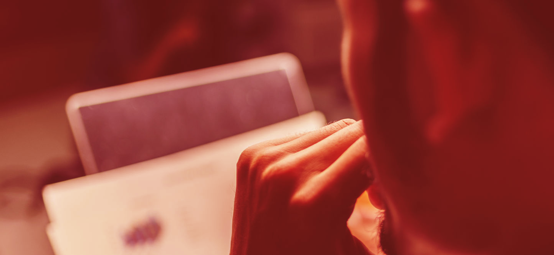 Man in front of a screen