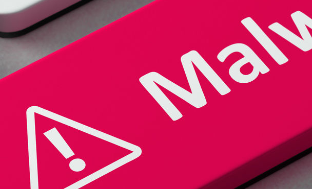 keyboard with the word malware