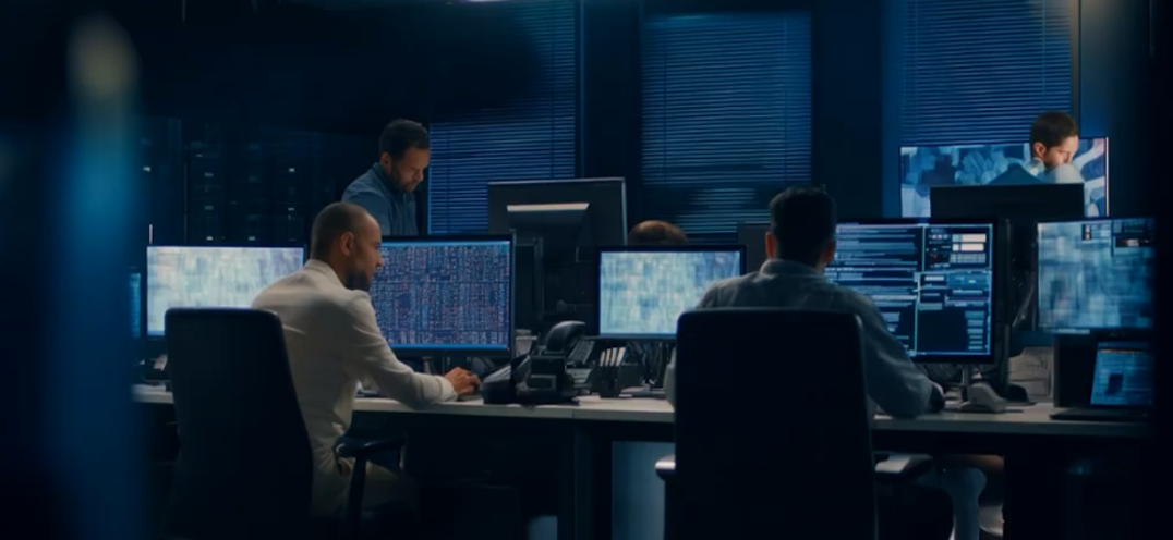 Five analysts working in a Security Operation Centre