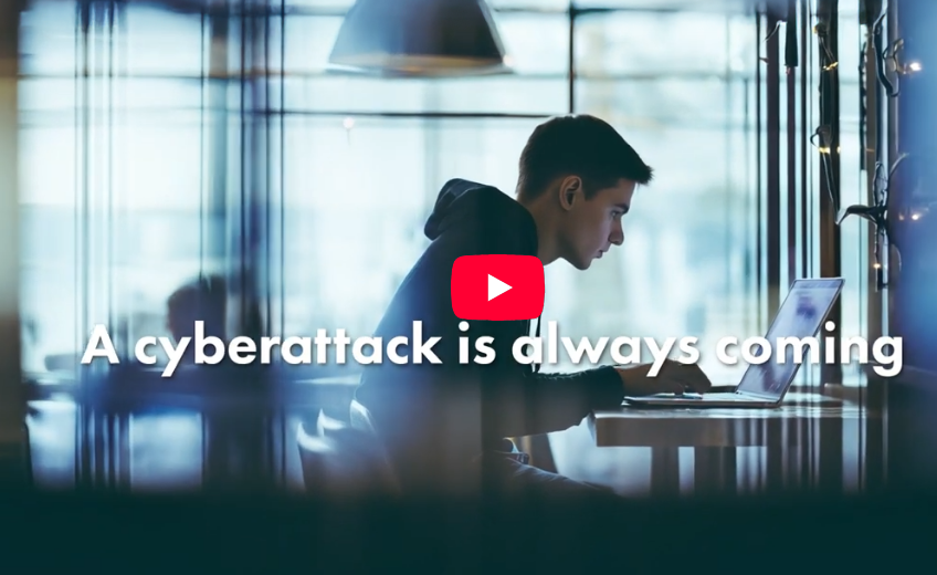 A young man working on his computer